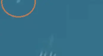 Daytime video of UFO flying near plane over Santarem in Portugal 26-Apr-2011
