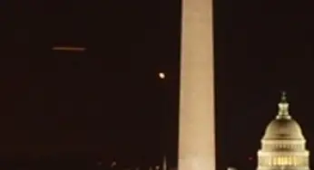 Cigar-shaped UFO caught on webcam in Washington D.C. 14-Feb-2011