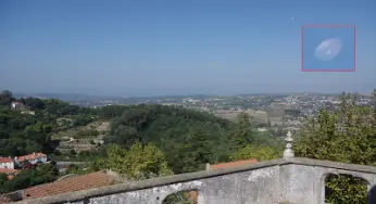 Daytime disc-shaped UFO photographed in Portugal 18-Sep-2010