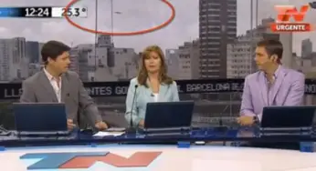 Flying object caught on tape during a live TV news broadcast. Is it what it appears to be?