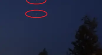 Ball of Light Splits Into Three In The Dark Sky