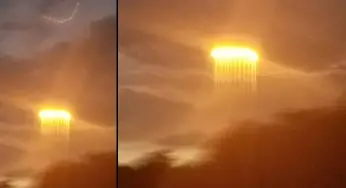 Bright Spheres and Evenly Spaced Beams of Light Below The Cloud Stun Deer Hunter In Missouri River, US