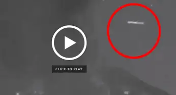 UFO Seen Flying Mysteriously Behind an Erupting Volcano