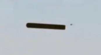 Cigar-shaped UFO with small UFOs around – Clayville, New York – 1-Oct-2020