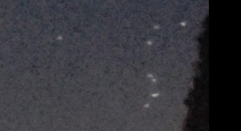 UFOs flying across the night sky above Las Vegas
