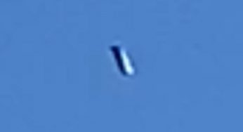 Cigar-shaped UFO over Albuquerque, NM